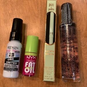 NWT make up lot includes, Redken, Pixie, NYX, Wet N Wild, Que Bella